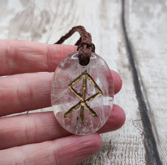 Clear quartz crystal courage bind rune stone.