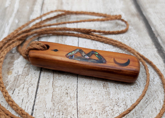 Scottish yew wood berkana nordic rune pendant.