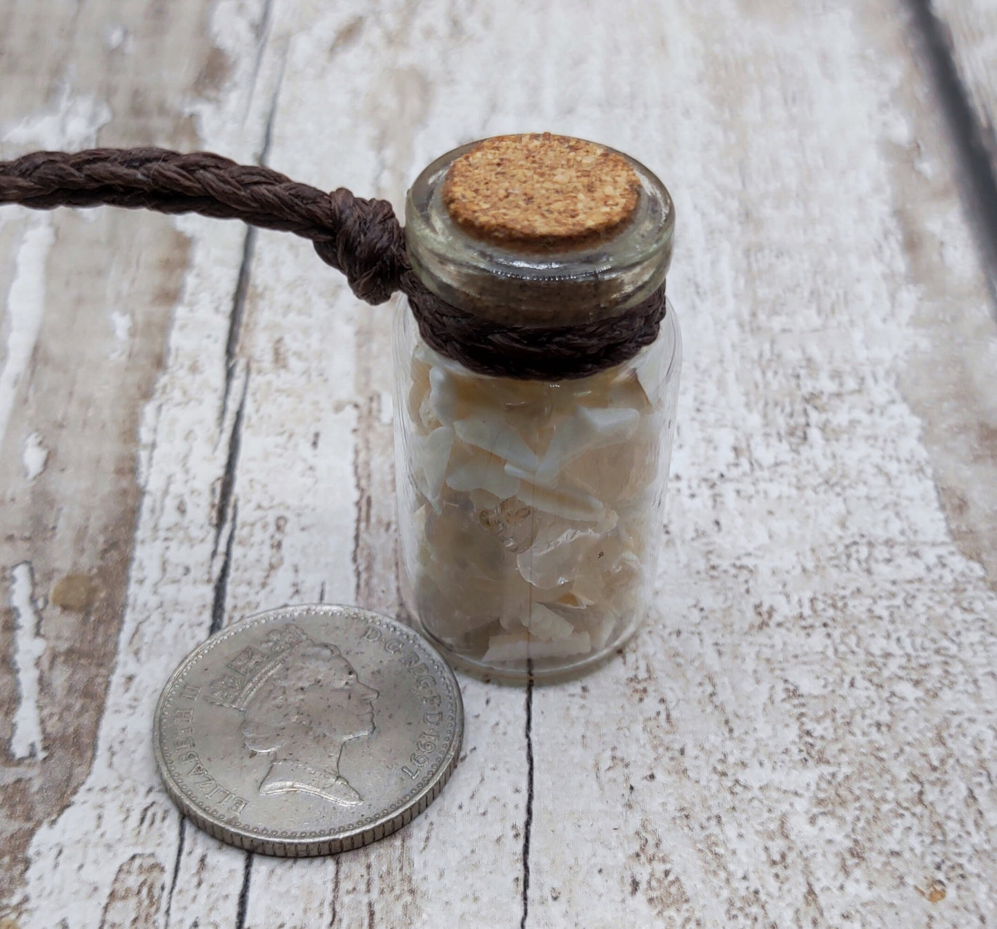 Mako sharks teeth and clear quartz bottle pendant.