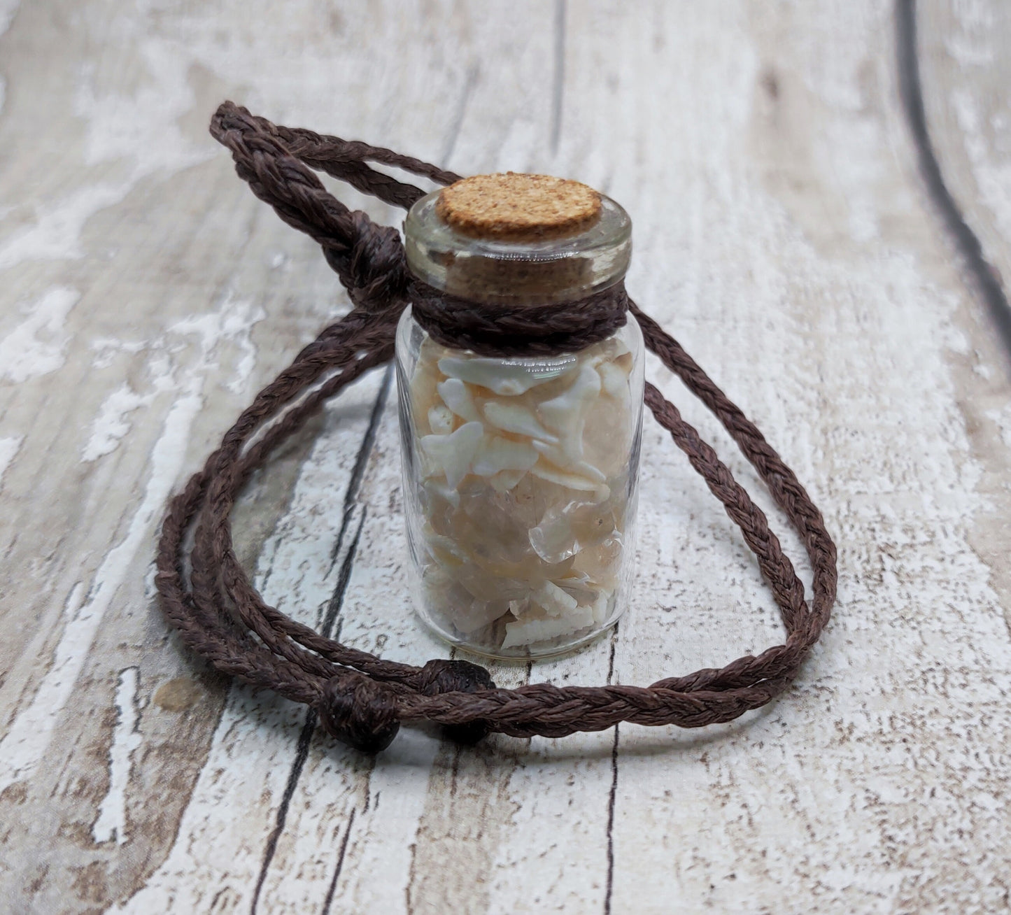 Mako sharks teeth and clear quartz bottle pendant.