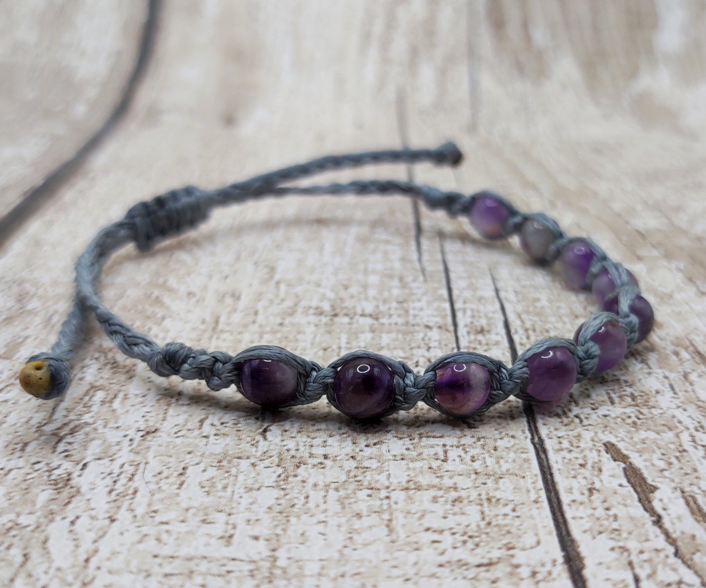 Amethyst 6mm adjustable macramé bracelet.